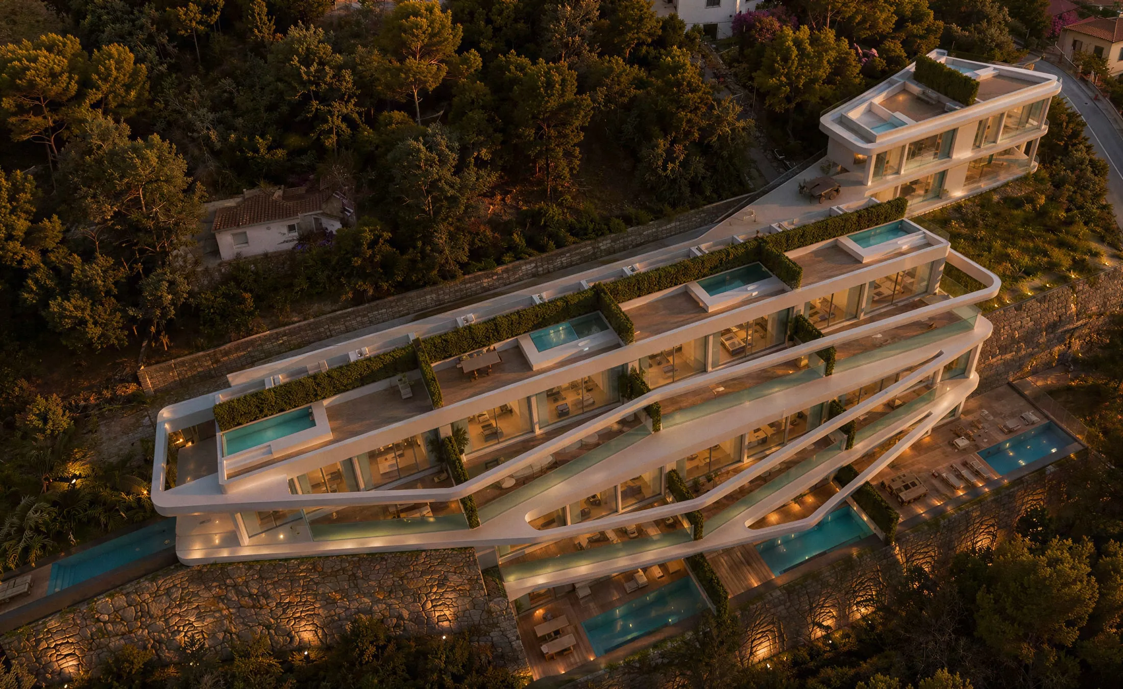 Doce residencias escalonadas sobre la ladera.